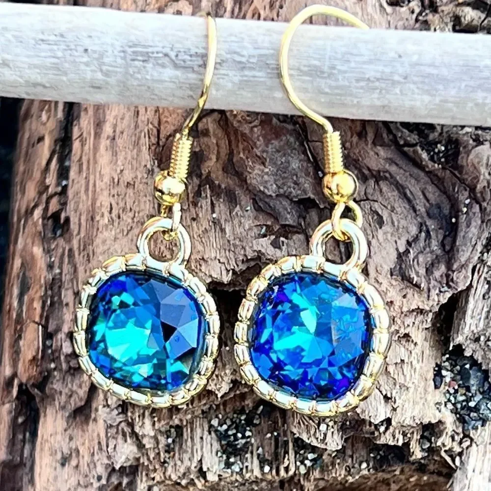 Earrings made with Bermuda Blue Swarovski crystal and gold earwires handcrafted